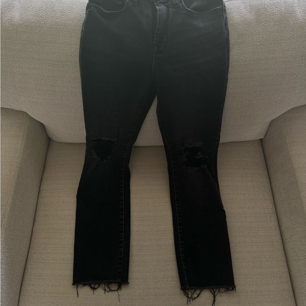 Good American Black Skinny Jeans with Distressed Details